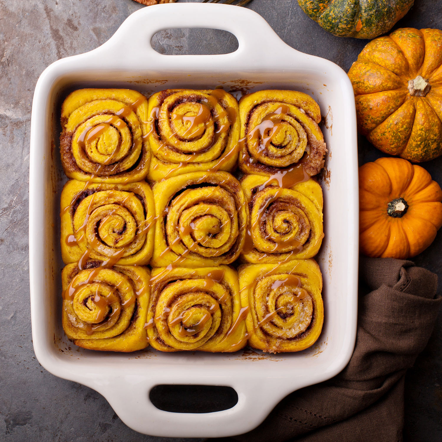 Photo of cinnamon rolls in a baking dish.