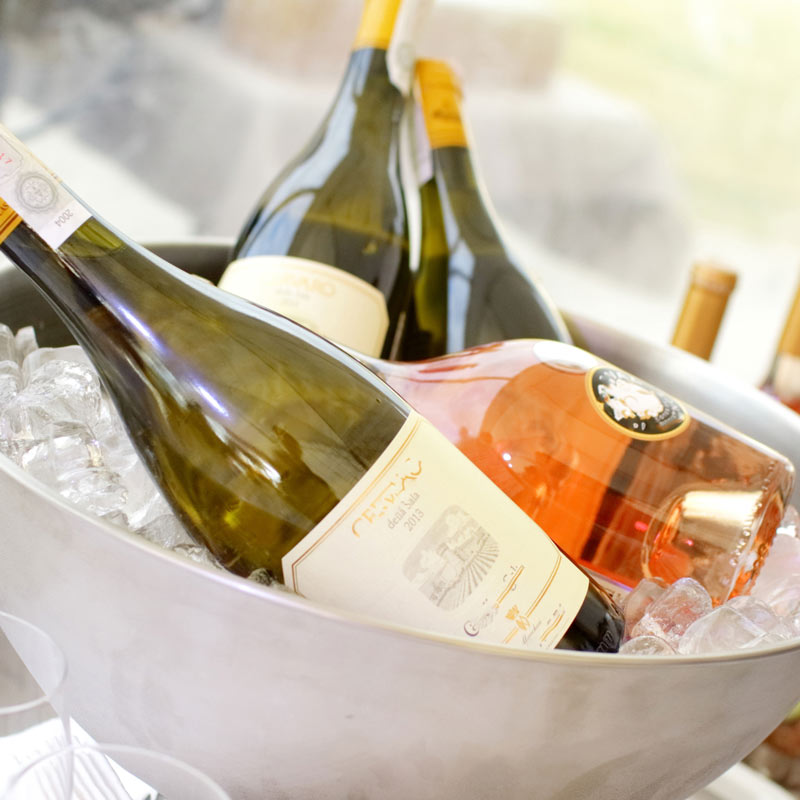 Wine in an ice bucket.