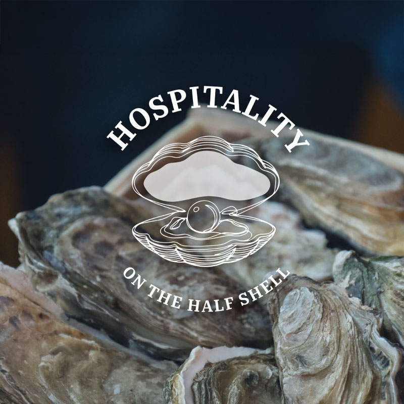 Photo of oysters with an wordmark on top of it.