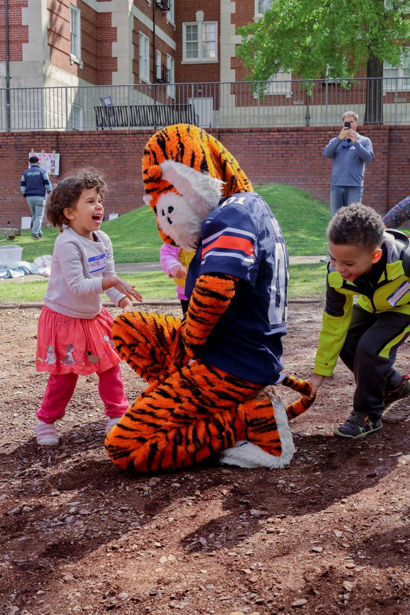 Photo of Aubir and children at Open House. 