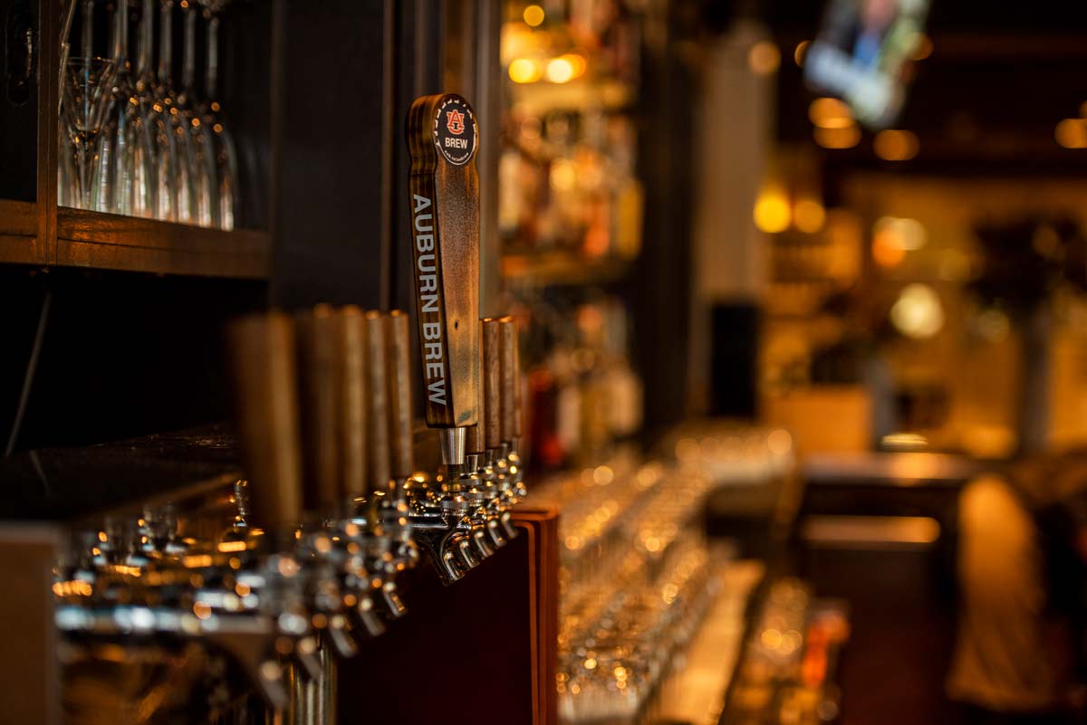 Photo of AU Brewing beer handle.
