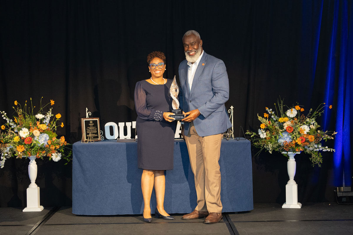 Portia Johnson aceepting award