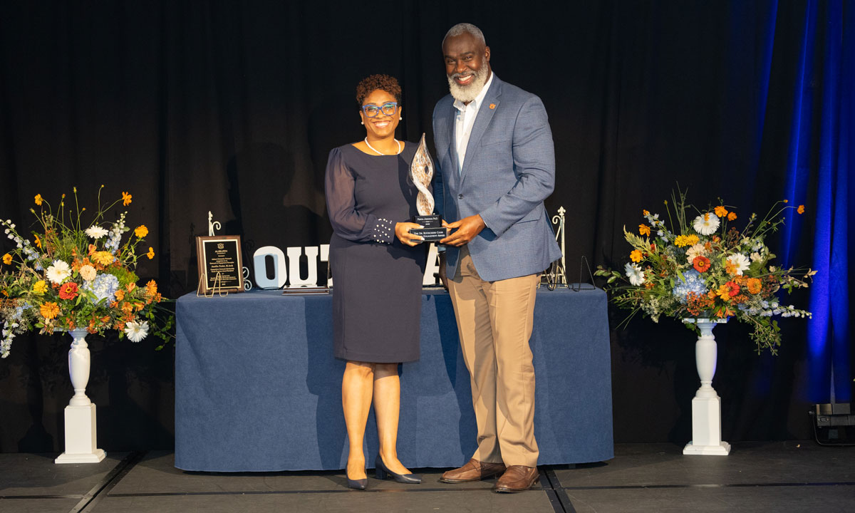 Portia Johnson accepting award
