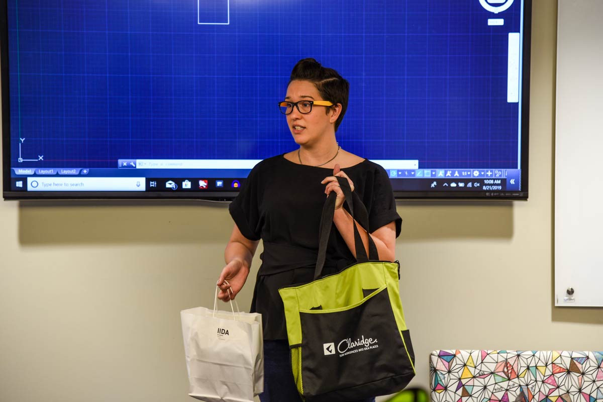 Lindsay Tan handing out swag bags.