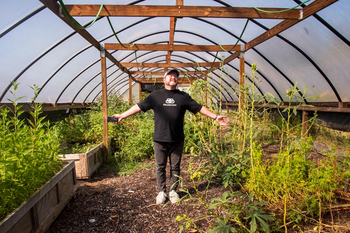 Photo of the fellows at The Secret Garden, a private farm in Macon County.