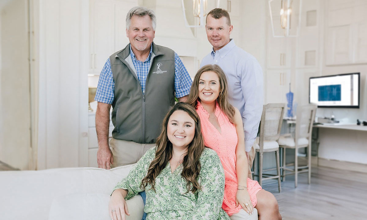 Caroline Mathews Campbell and Grace Stearns (front) with their fathers John Mathews and Chad Stearns